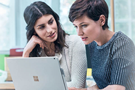 Two Women on a Laptop